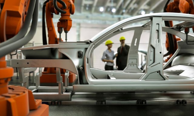 Bot working on automotive production line